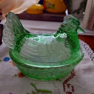 Vintage green glass hen on neat